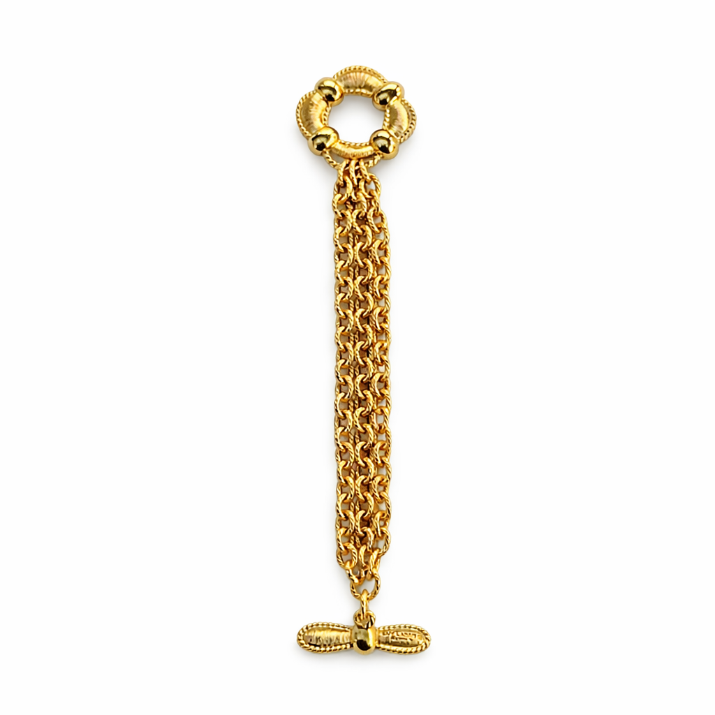 Bracelet vintage Guy Laroche doré.  Design chaînes multiples avec fermoir T-bar élégant.