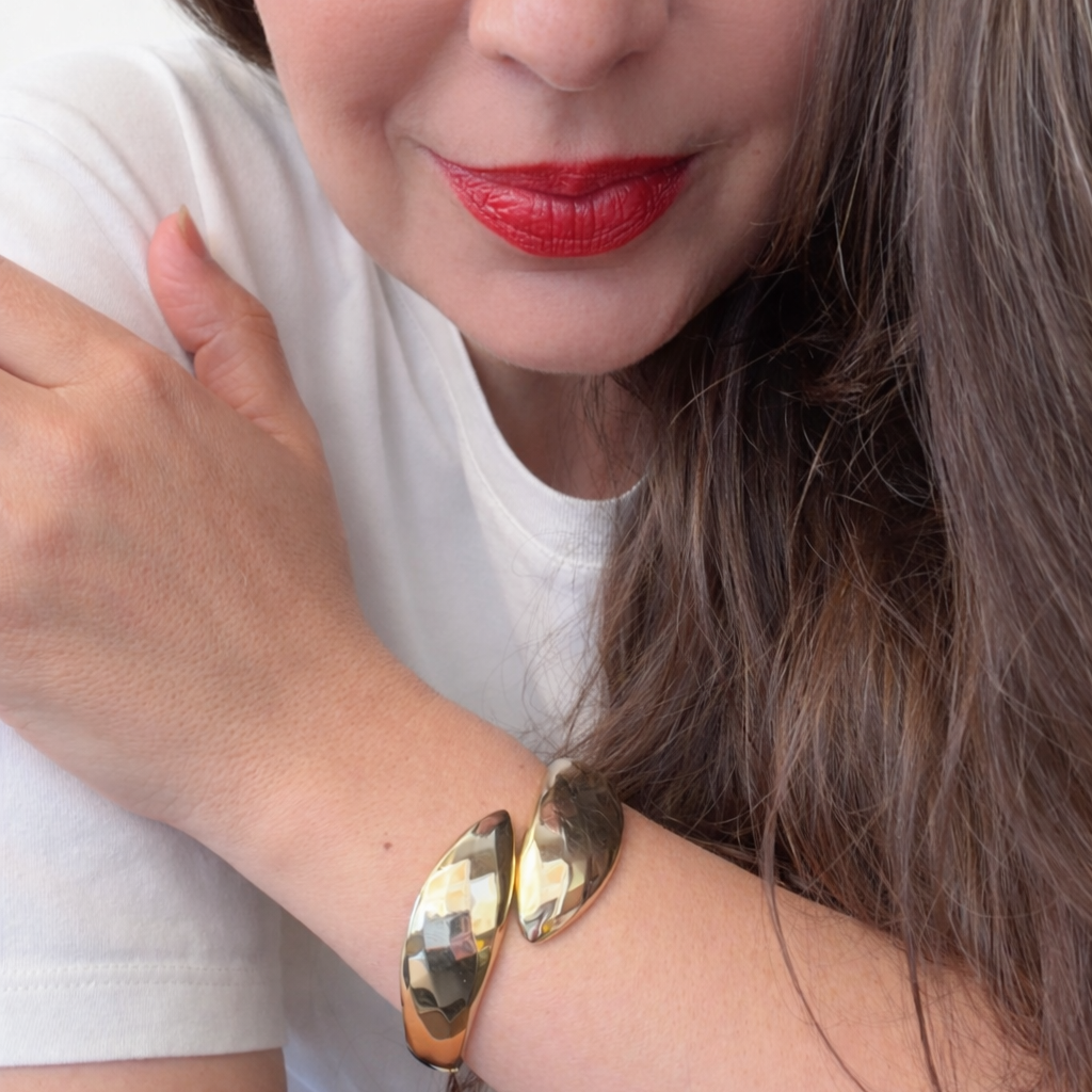 Bracelet manchette serpent vintage doré à ressort – années 80